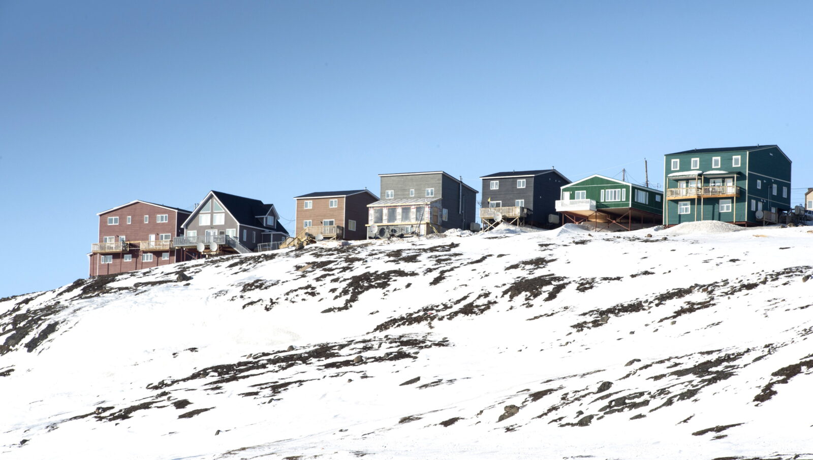 Houses are seen Saturday, April 25, 2015 in Iqaluit, Nunavut. THE CANADIAN PRESS/Paul Chiasson