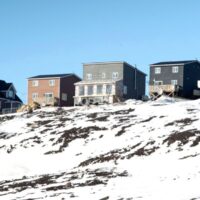 Houses are seen Saturday, April 25, 2015 in Iqaluit, Nunavut. THE CANADIAN PRESS/Paul Chiasson