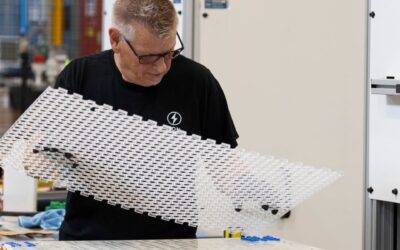 An employee works on a prototype of an electric battery at Lion Electric Company's lithium-ion battery manufacturing facility in Mirabel, Que., Thursday, Sept. 14, 2023.